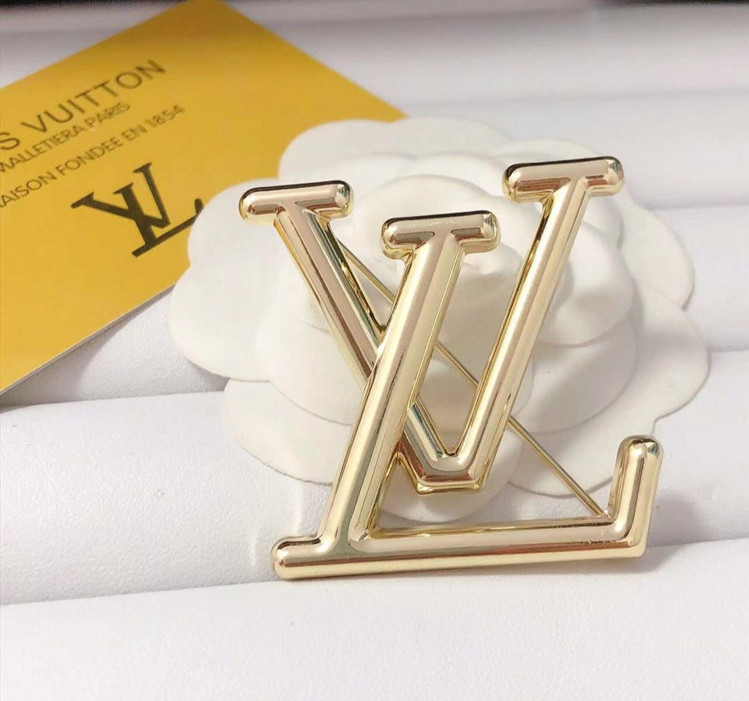 LV inspired Brooches