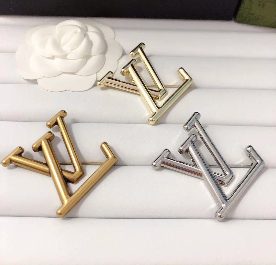 LV inspired Brooches