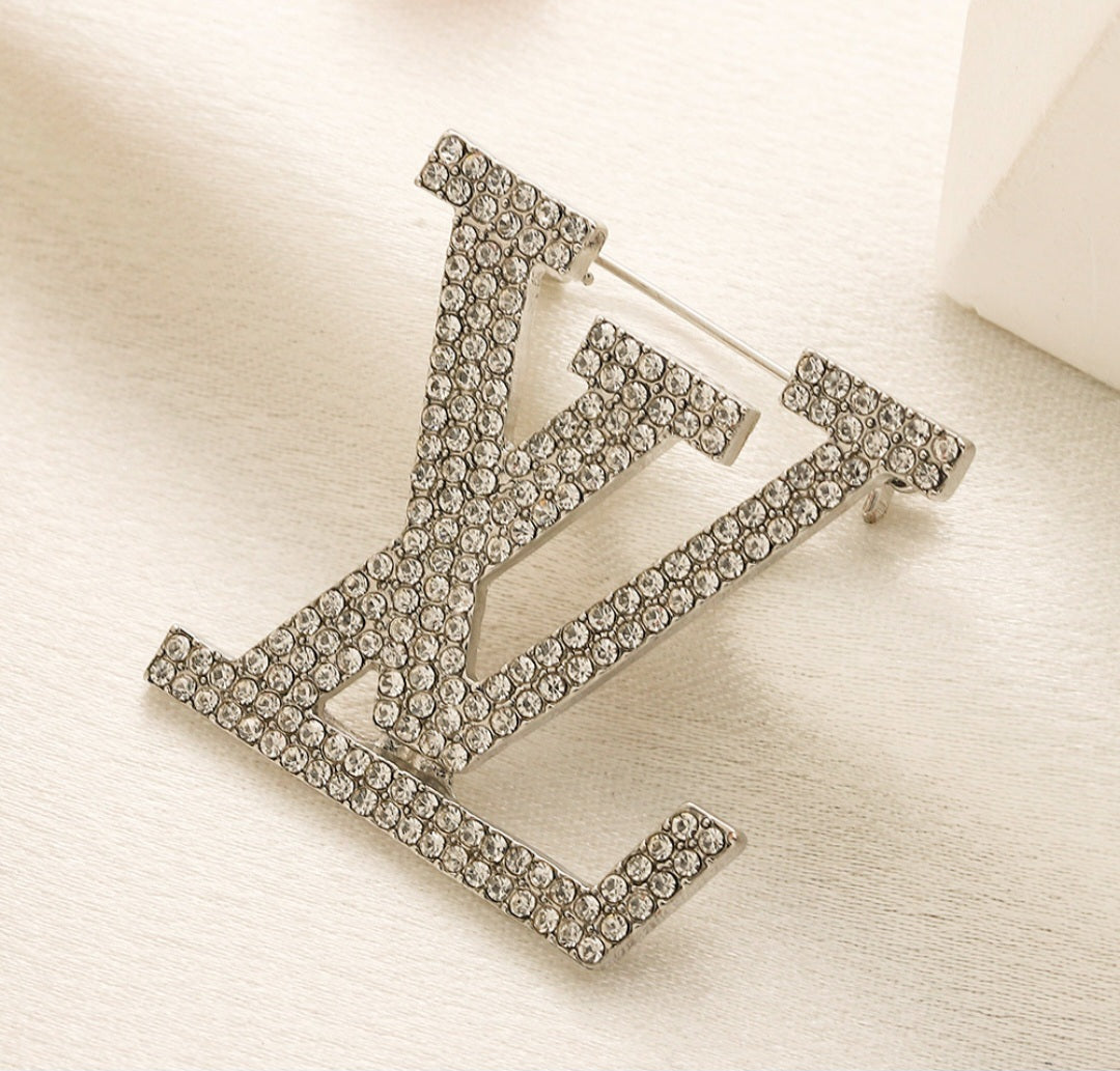 LV inspired Brooches