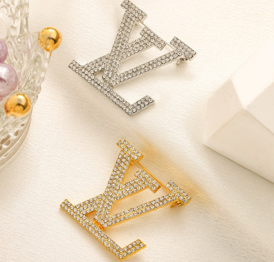 LV inspired Brooches