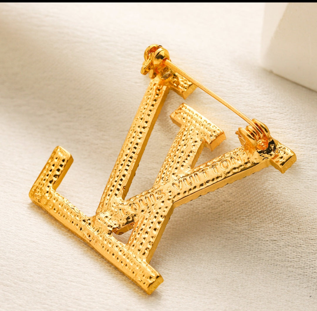 LV inspired Brooches