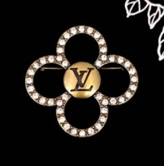 Lv inspired Brooches