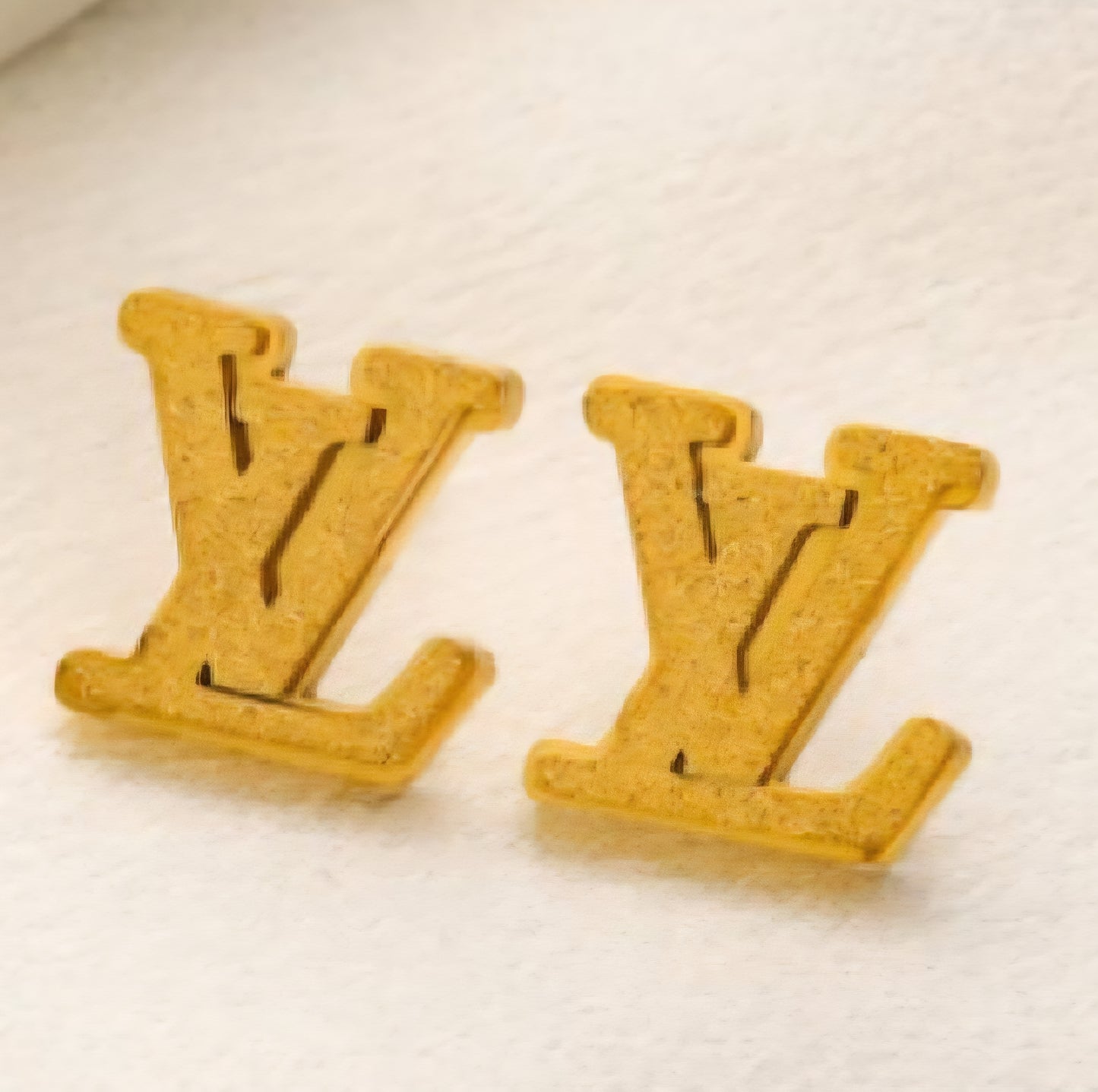 LV inspired stud earrings