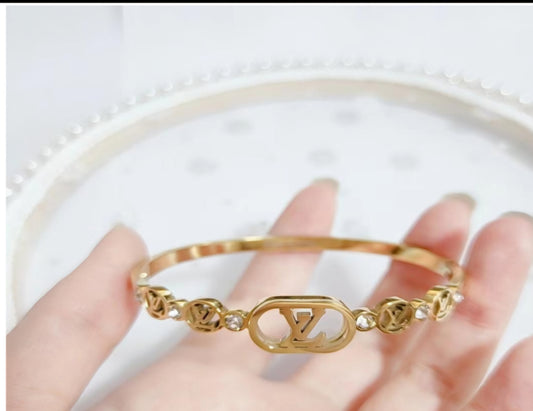 LV inspired Bangle
