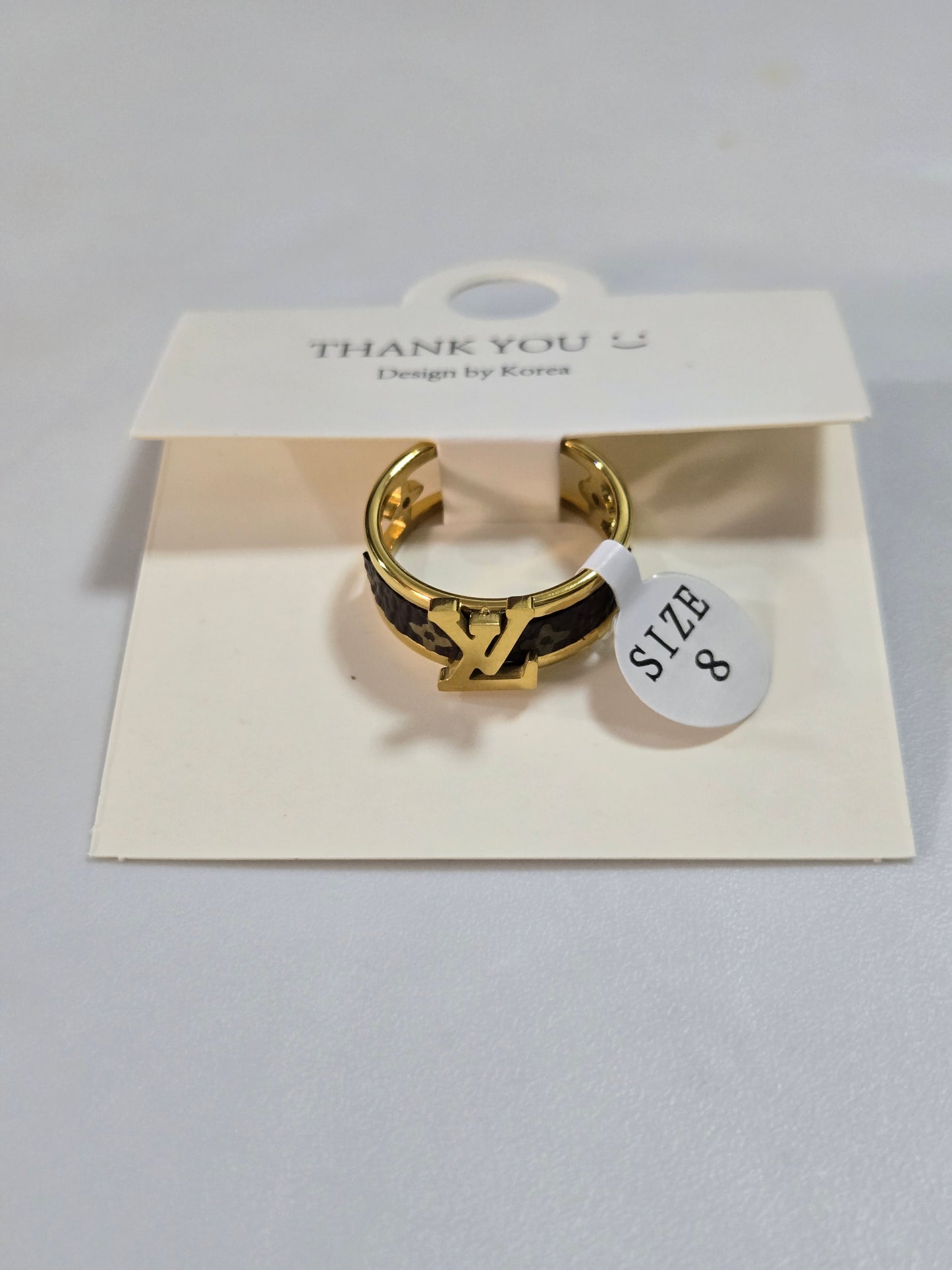 LV inspired rings