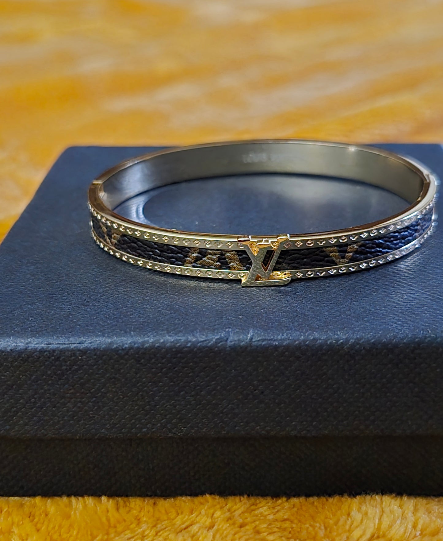 LV inspired Bangle